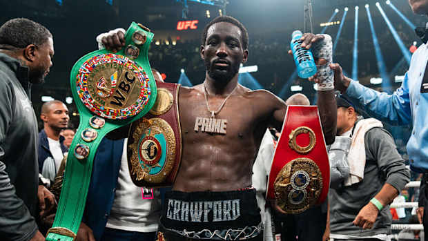 Terence Crawford has his hand raised, finishing Errol Spence Jr. in Las Vegas.